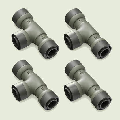 Tee Connector for Irrigation Lines on a soft green background