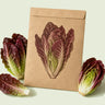 Kraft seed packet illustrated with Truchas Mini Romaine Lettuce, with fresh Truchas Mini Romaine Lettuce beside it