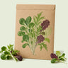 Kraft seed packet illustrated with Umami Asian Microgreens Blend, with fresh Umami Asian Microgreens Blend beside it