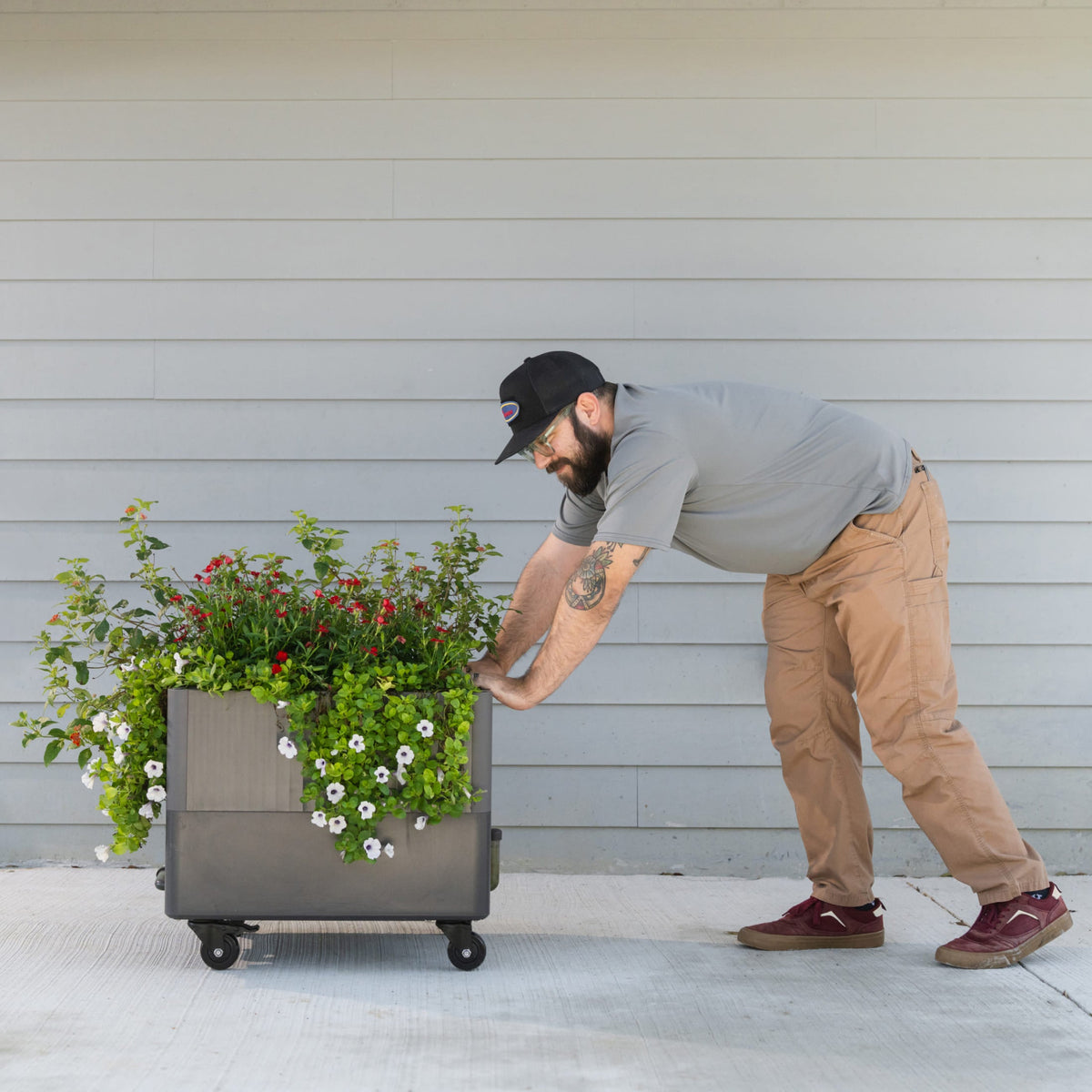 Product photo of self-watering rolling planter, 21 x 24 inches