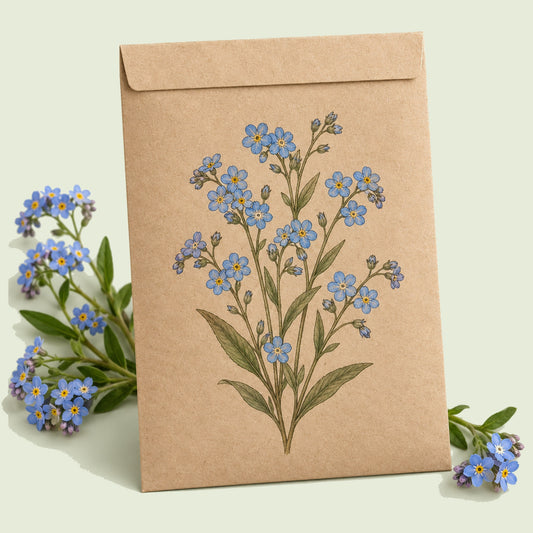 Kraft seed packet illustrated with Victoria Blue Forget Me Not, with fresh Victoria Blue Forget Me Not beside it