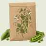 Kraft seed packet illustrated with Wando Garden Shelling Pea, with fresh Wando Garden Shelling Pea beside it