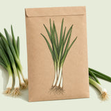 Kraft seed packet illustrated with White Lisbon Bunching Onion, with fresh White Lisbon Bunching Onion beside it